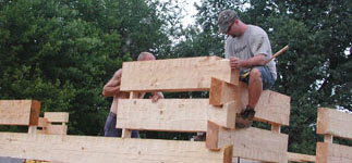 Step 2:  Erect log home exterior walls